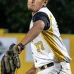 Right-handed pitcher, Cruz Cabral, delivers an off-speed pitch.