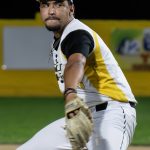 Right-handed pitcher, Nathan Medina, delivers a pitch.
