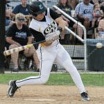 Right-handed batter, Tyler Zahniser, swings at the pitch.