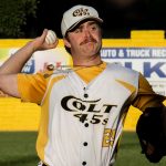 Right-handed pitcher, Daniel Aceto, delivering to the plate with a four-seam fastball grip.