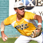 Left-fielder Isaiah Cortez starts his throw to second base.