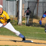 First baseman Kyle Norton receives a throw to first for a force out.