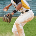 Shortstop Ariv Camacho starts his throw to first base after fielding a ground ball.