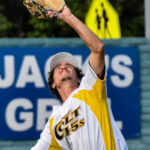 Shortstop, Drew Kaatz, tracks a fly ball (versus Santa Rosa Rosebuds, Sunday, May 28th).