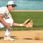 Second baseman, Dusty Vela, awaits the throw with a player sliding head-first into the bag (versus West Coast Kings, Sunday, June 4th).