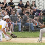 Third baseman Mason Johnson receives the ball as a base runner begins sliding into the bag (versus Fresno Athletics, Sunday, June 11th, 2023).