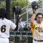 Third baseman, Mason Johnson, taps helmets with Catcher, Mackenzie Higuchi, after Johnson's solo-shot homerun (versus Novato Knicks, Sunday, June 15th, 2023).