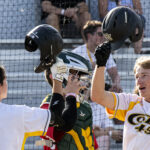 Shortstop, Brett Dingess, celebrates a solo-shot homerun by tapping helmets with second baseman, Dusty Vela (versus Novato Knicks, Sunday, June 15th, 2023).