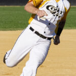 Baserunner, Mason Johnson, rounds third base and heads toward home (versus Fairfield Indians, Sunday, July 2nd, 2023).