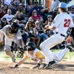 Colt 45s base runner slides head-first into home place (photograph by Bill Wagner).
