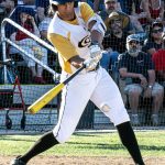 Batter, Dom DeCanio, swings at the pitch (photograph by Bill Wagner).