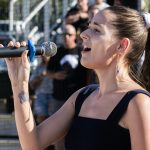Performance of the Star Spangled Banner during the pregame ceremony by Nala Kathleen (photograph by Bill Wagner).