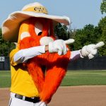 Colt 45s mascot, Homer, standing on the field and getting the crowd excited for the Dizzy Bat Race game.