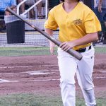 Colt 45s batboy shuffling toward the dugout with a Louisville Slugger in tow (photographed by Bill Wagner on 2026-07-24).