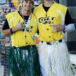 Colt 45s players, Timmy Ayers and Andrew Mora, wearing hula skirts for Hawaiian Night (photographed by Bill Wagner on 2026-07-24).